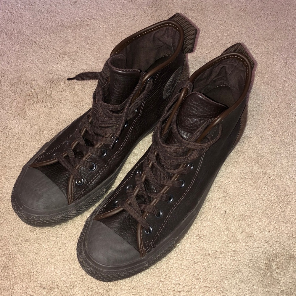 Brown leather converse